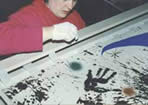 Conservation taping Miro' silkscreen 